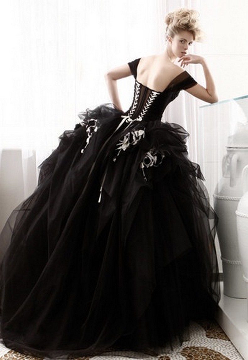 Black wedding dress with white belt and flowers