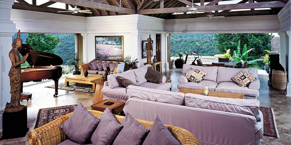 Silent Waters Villa in Montego Bay, Jamaica photo 3 - Inside the main pavilion, plush couches share space with Asian art and a baby grand piano